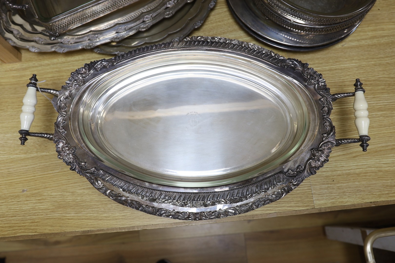 A quantity of various plated wares including a set of oval serving dishes and two-handled dishes